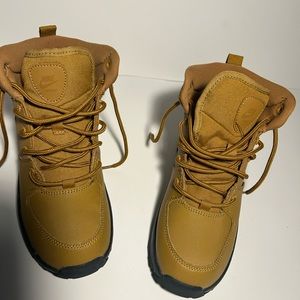 Gold and black nike boots